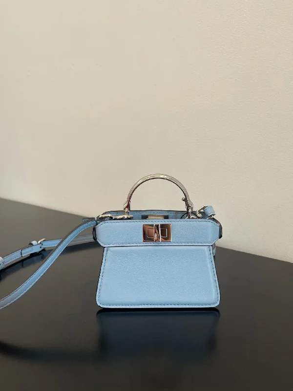 Ladies Fendi Peekaboo bags with a detachable shoulder strap for different carrying optionsFendi Peekaboo ISeeU Petite Blue Micro Bag For Woman 11cm/4.5in