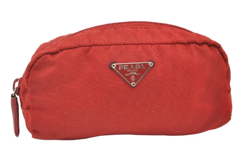 Prada Cahier bags featuring the signature triangular logo plaqueAuthentic PRADA Vintage Nylon Leather Pouch Purse Red 0327K