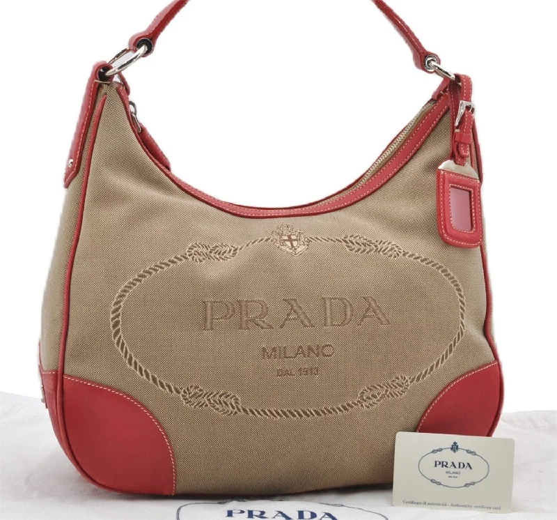 Prada Cahier bags with a monogram - embossed leather surfaceAuthentic PRADA Logo Jacquard Canvas Leather Shoulder Bag BR3422 Beige 8248F