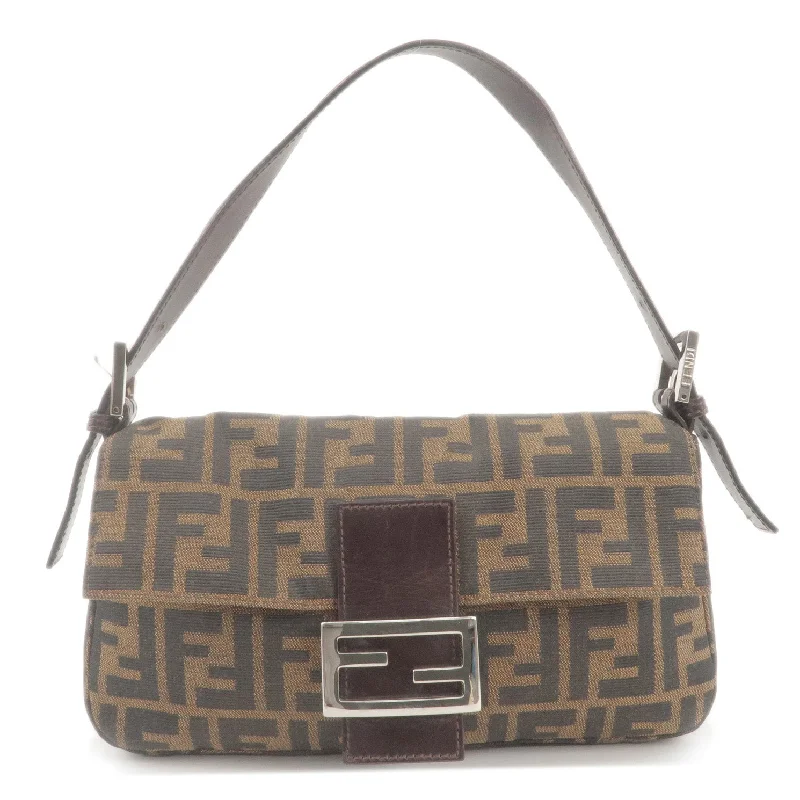 Ladies Fendi Peekaboo bags with a detachable shoulder strap for different carrying optionsFENDI Zucca Mamma Baguette Canvas Leather Hand Bag 26424