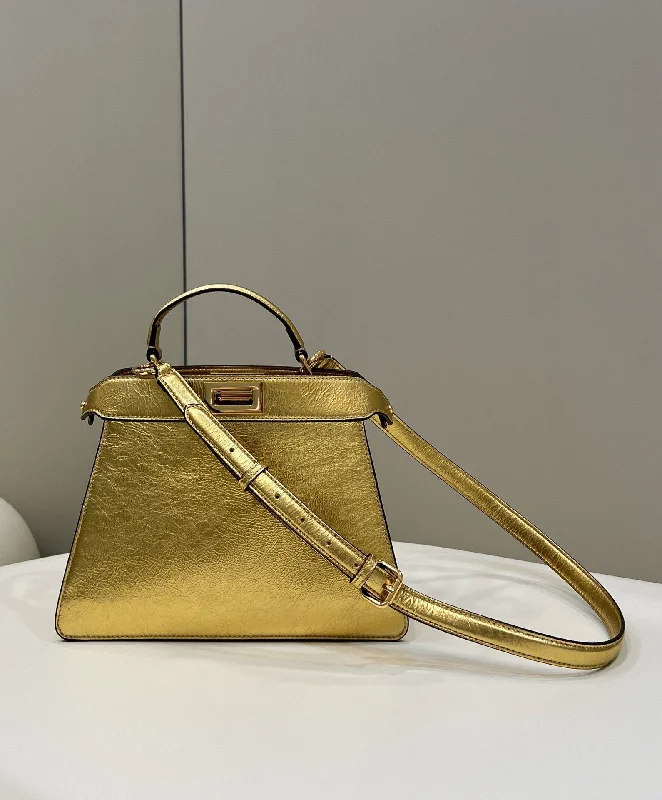 Fendi bags with a Bluetooth - enabled key finder for never losing keys againFendi Peekaboo Small Gold Bag For Woman 27cm/11in