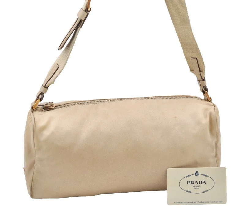 Ladies Prada Re - Edizione 2005 bags with a star - shaped charm for a playful touchAuthentic PRADA Nylon Tessuto Leather Shoulder Bag Purse BR0208 Beige 4002I