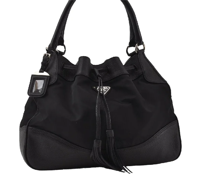 Prada tote bags with a printed Prada logo on the front for brand visibilityAuthentic PRADA Nylon Tessuto Leather Tassel Drawstring Tote Bag Black 4550I