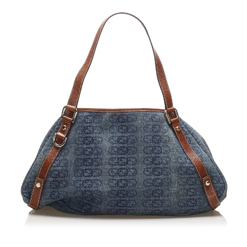 Women Gucci bags with a chain - link trim and a leather bodyGucci GG Denim Pelham Tote Bag (SHG-12975)