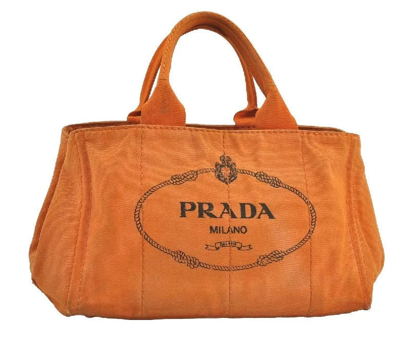 Prada handbags with a perforated leather detail for a unique and breathable designAuthentic PRADA Canapa M Vintage Canvas Tote Hand Bag Orange 2457I