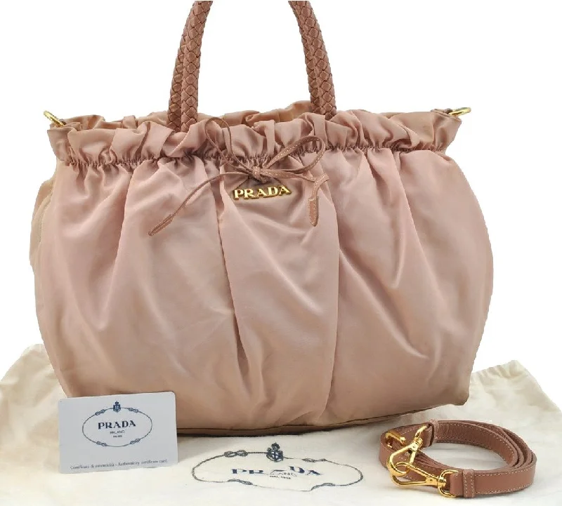 Ladies Prada Galleria bags with a textured leather surface for a more tactile lookAuthentic PRADA Tessuto Bow Nylon Leather 2Way Tote Hand Bag BN1778 Pink 2183I