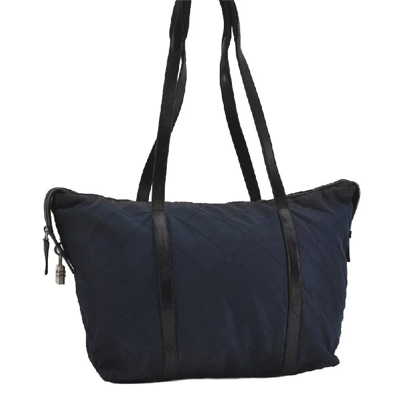 Prada tote bags with a spacious interior and a magnetic - snap closureAuthentic PRADA Quilting Nylon Tessuto Leather Shoulder Tote Bag Navy Blue 0046I