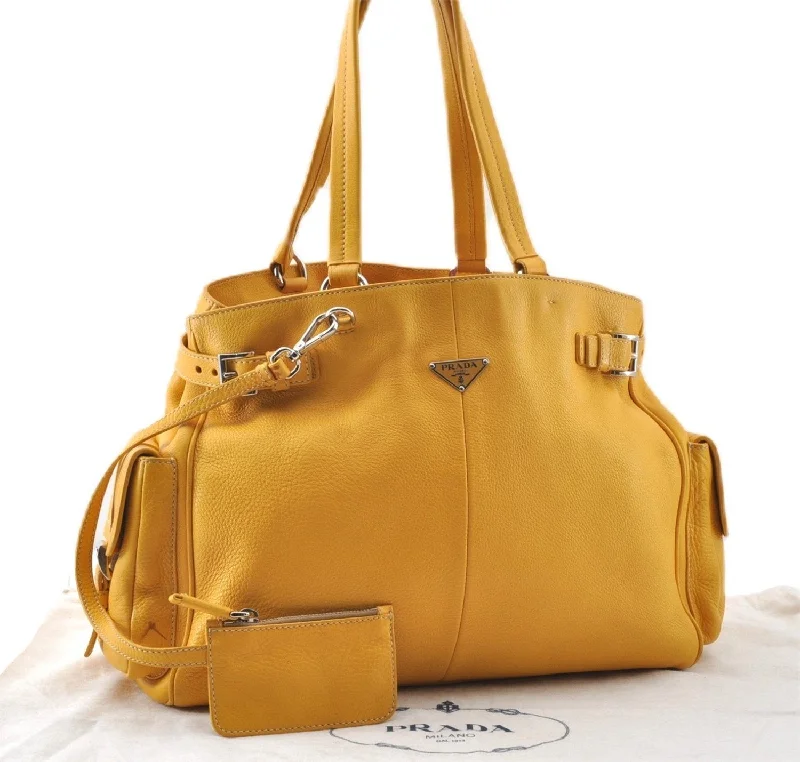 Prada handbags with a perforated leather detail for a unique and breathable designAuthentic PRADA Vintage Leather Shoulder Hand Bag Yellow 1005G