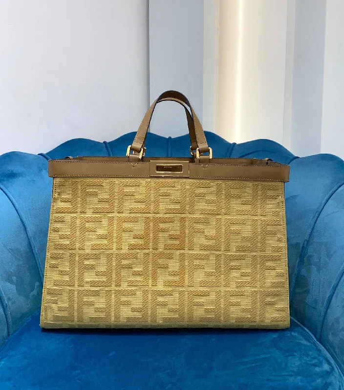 Ladies Fendi Peekaboo bags with a hand - carved leather detail for a unique and artisanal touchFendi Peekaboo x Tote Bag