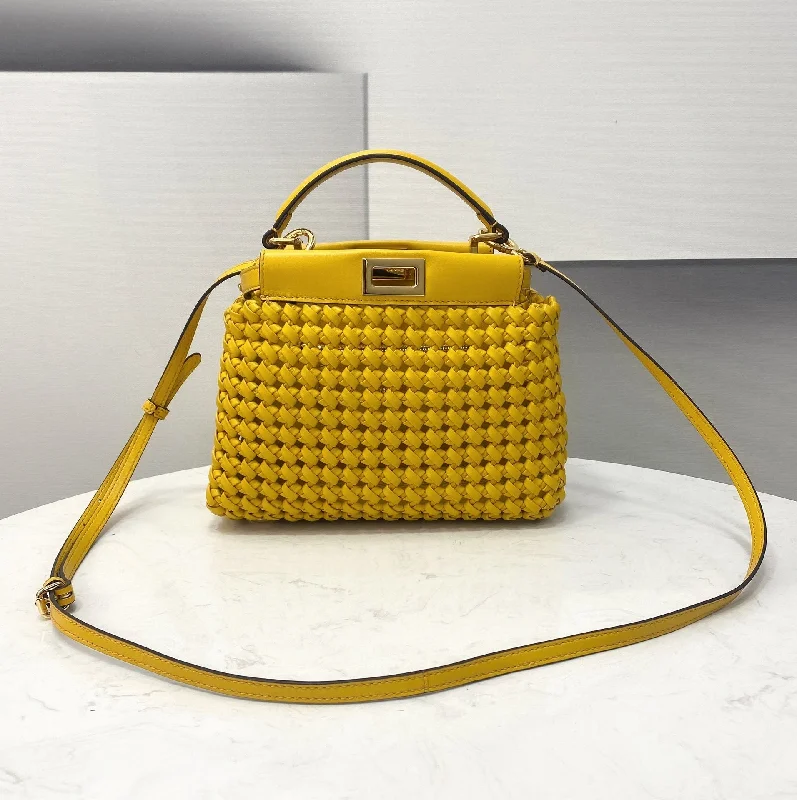 Fendi By The Way bags with a suede interior lining for a luxurious and soft feelFendi Peekaboo Mini Yellow Braided Bag For Woman