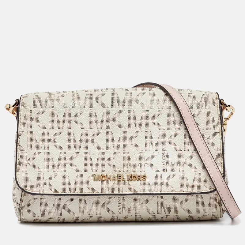 Michael Michael Kors Bags for fashion bloggers to showcase on social mediaIvory Signature Coated Canvas Crossbody Bag