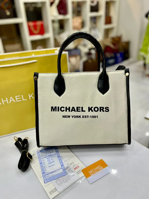 Michael Michael Kors Bags for ballet recitals to match the elegance of the eventWomen's MICHAEL KORS Handbag with Long Belt (Cream & Black)