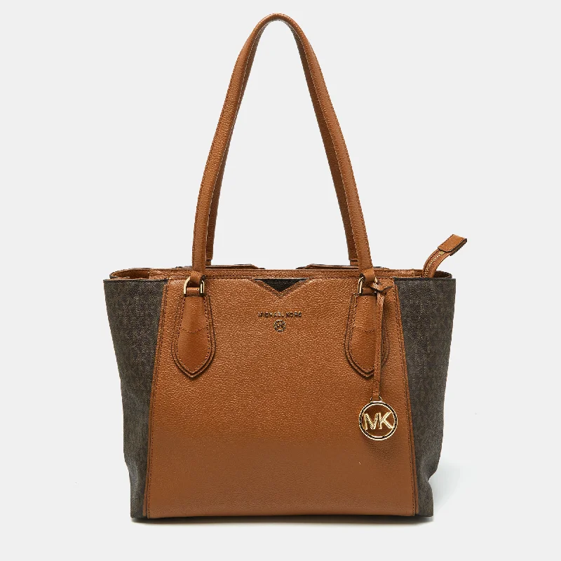 Michael Michael Kors bucket bags in classic black for a timeless lookBrown/Tan Signature Coated Canvas and Leather Mae Tote