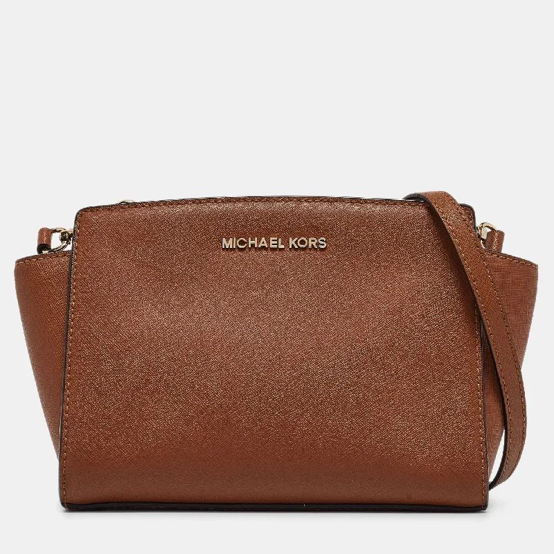 smooth leather Michael Michael Kors handbags for a sleek lookBrown Leather Small Selma Crossbody Bag