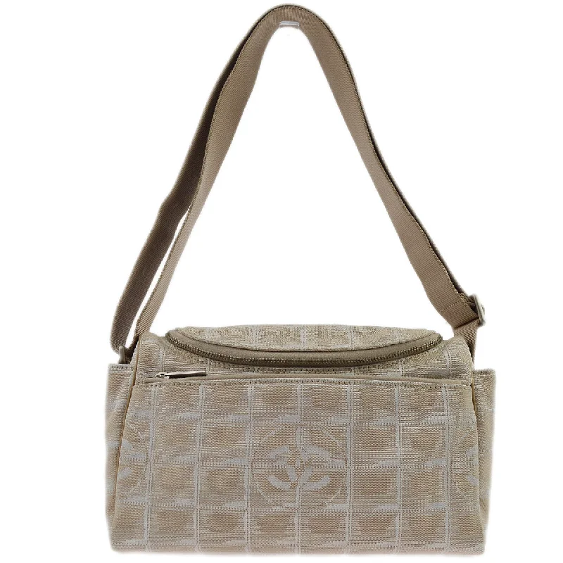 Chanel bags with leather and tweed combinationsChanel Beige Jacquard Nylon Travel Line Shoulder Bag