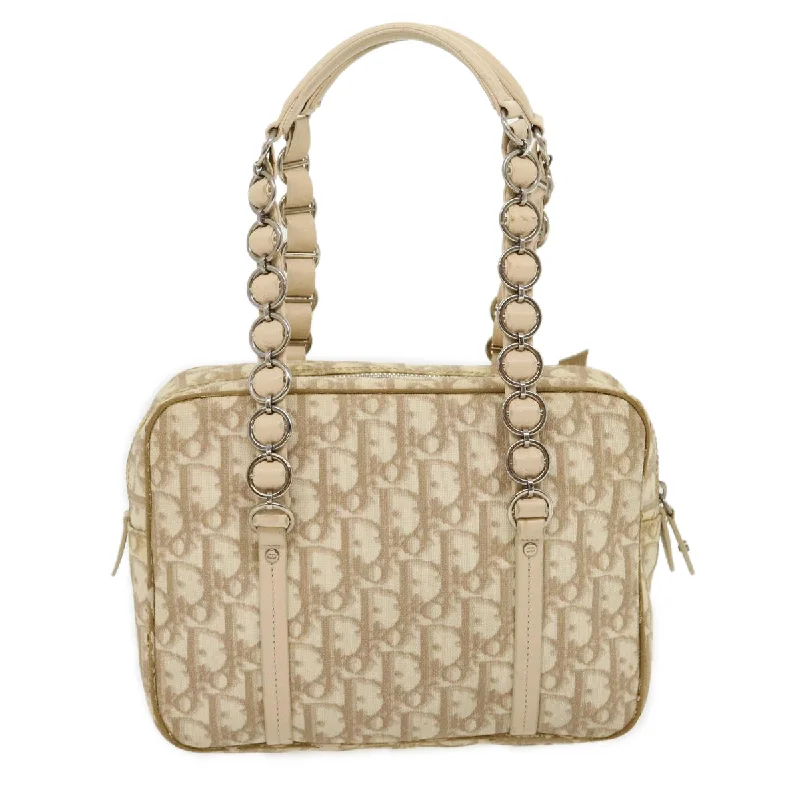 Christian Dior bags with a quilted pattern and gold - toned hardwareCHRISTIAN DIOR Trotter Canvas Hand Bag PVC Leather Beige Auth yk4818