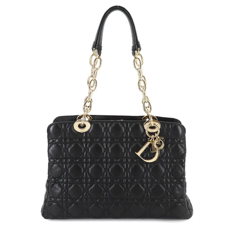 Christian Dior Saddle bags with a studded trim for a bold lookDior Soft shopping Tote