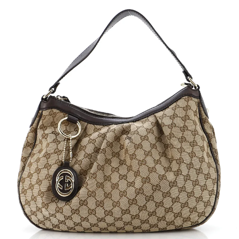 Christian Dior bags with a side - pocket for holding a water bottleSukey Hobo GG Canvas Medium